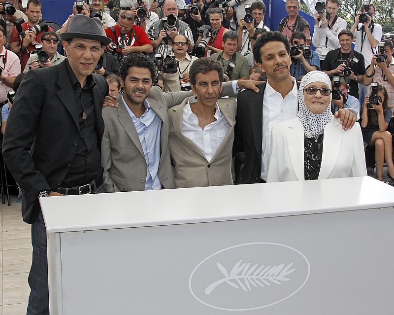 Director Bouchareb poses with cast members during a photocall at the 63rd Cannes Film Festival