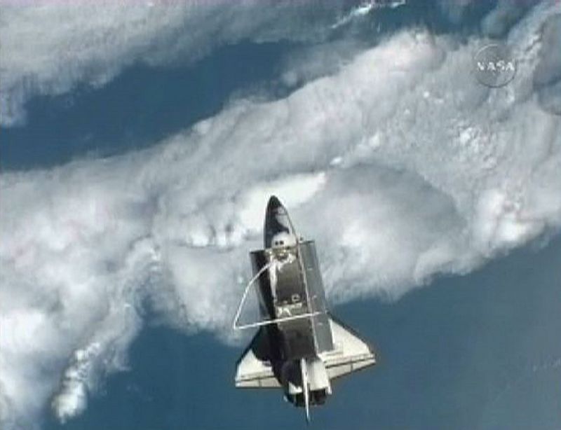 Image taken from NASA TV shows Space shuttle Atlantis pictured against the Earth