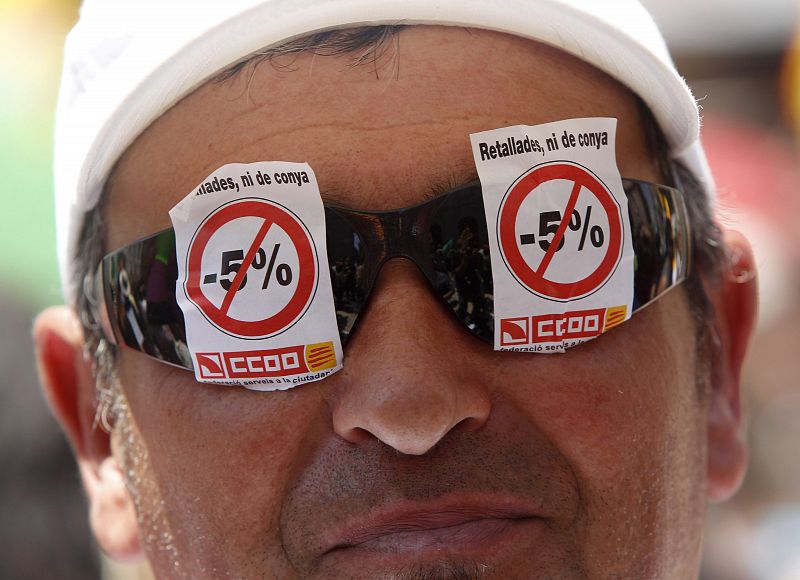 Public sector workers march during a general strike called by the public sector in Barcelona