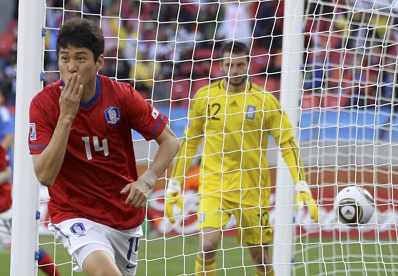 South Korea's Lee Jung-soo celebrates scoring a goal against Greece during their 2010 World Cup Group B soccer match at Nelson Mandela Bay stadium