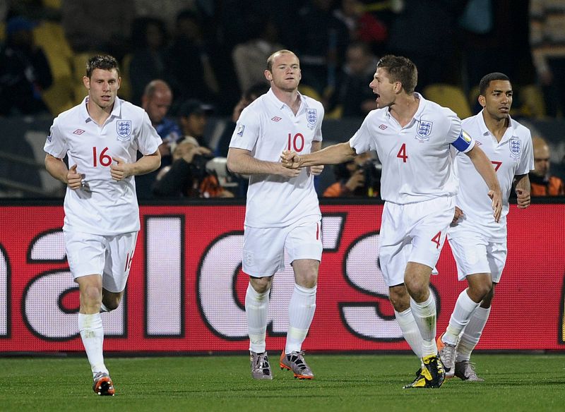 England's Gerrard celebrates near team mates after scoring against the US during a 2010 World Cup Group C soccer match in Rustenburg