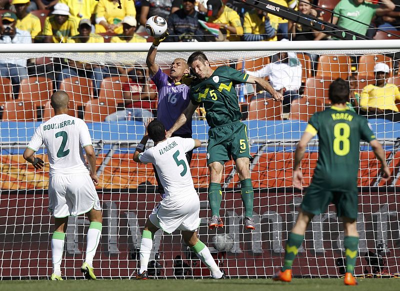 Algeria's goalkeeper Chaouchi makes a save against Slovenia's Cesar during the 2010 World Cup Group C soccer match at Peter Mokaba stadium in Polokwane