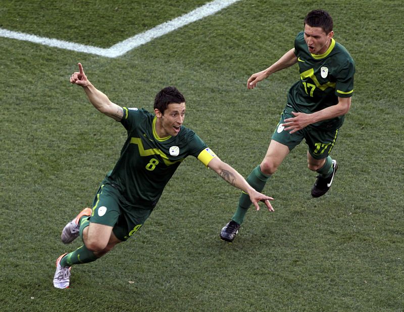 Slovenia's Koren celebrates after scoring against Algeria during a 2010 World Cup Group C soccer match at Peter Mokaba stadium in Polokwane