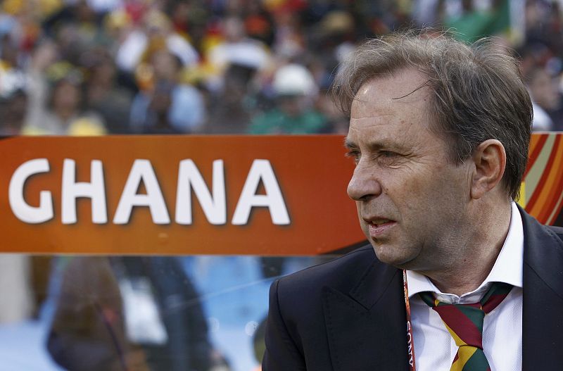 Ghana's coach Milovan Rajevac watches his players before the start of the 2010 World Cup Group D soccer match in Pretoria