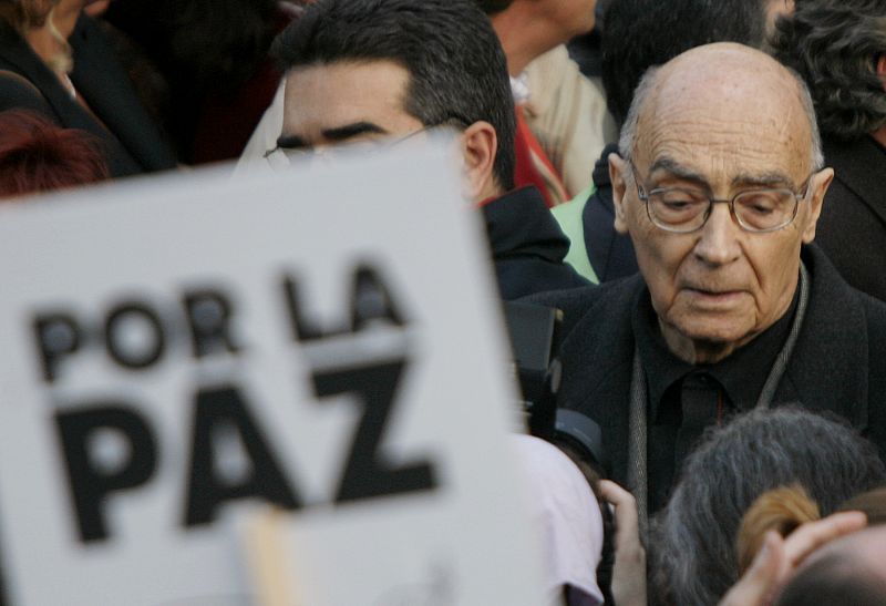 Literature nobel prize laureate Saramago marches during a demonstration through central Madrid