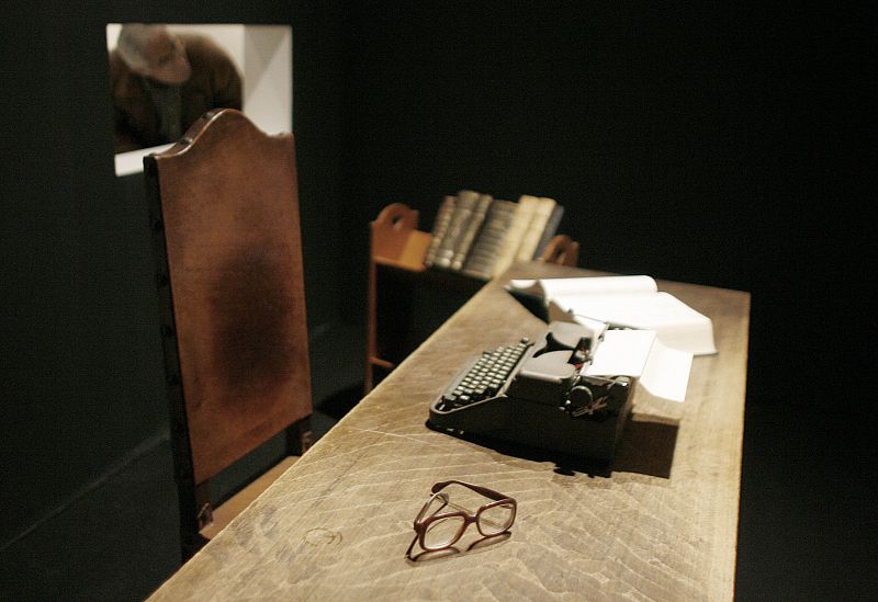 The typewriter, table and glasses of the Portuguese Nobel Literature laureate Jose Saramago are seen at an exhibition in Lisbon