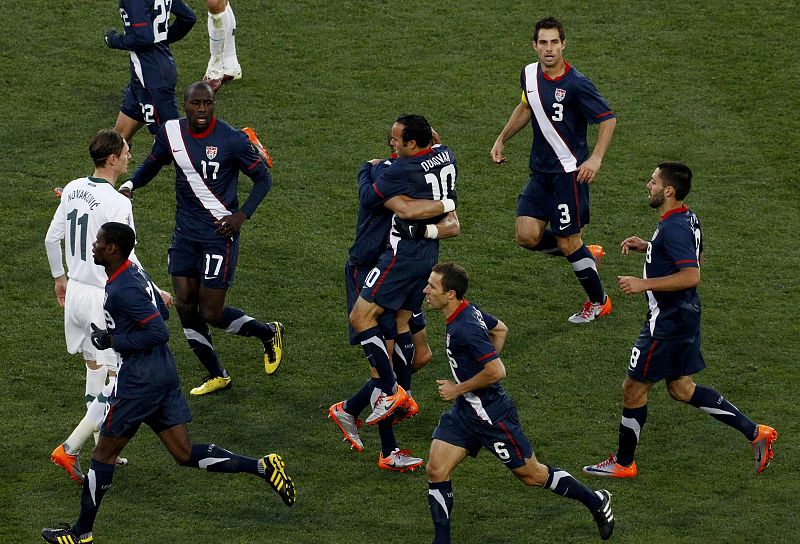 Donovan of the US celebrates with team mates after scoring against Slovenia during a 2010 World Cup Group C soccer match in Johannesburg