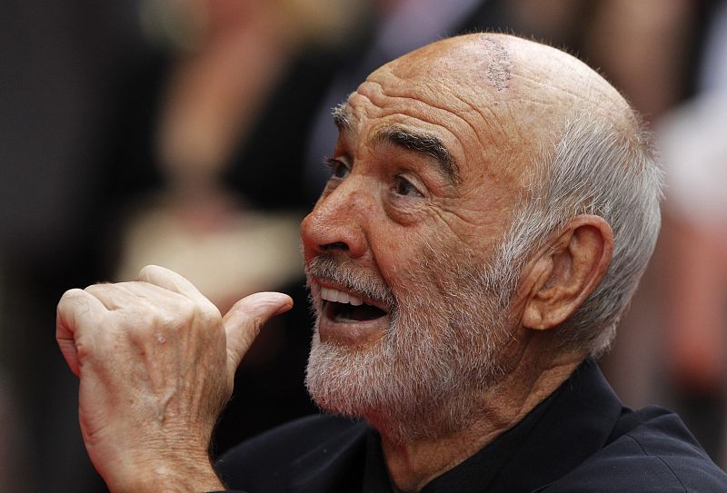 Actor Sean Connery signs autographs for fans on arrival for the Edinburgh International Film Festival