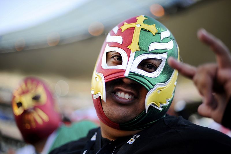 A fan gestures ahead of a 2010 World Cup Group A soccer match between Uruguay and Mexico in Rustenburg