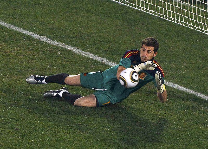 Spain's goalkeeper Iker Casillas makes a save during a 2010 World Cup Group H match against Chile at Loftus Versfeld stadium in Pretoria