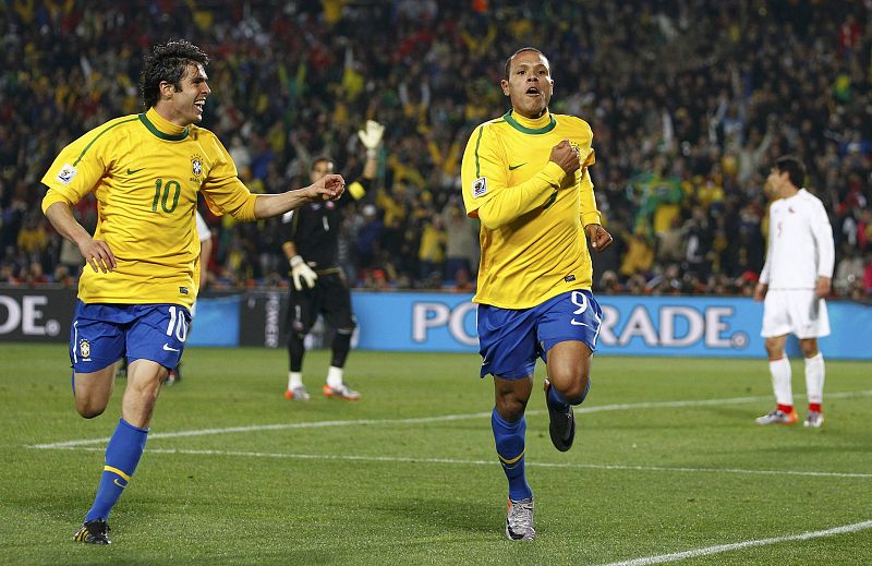 Brazil's Luis Fabiano celebrates his goal next to Kaka during the 2010 World Cup second round soccer match against Chile at Ellis Park stadium in Johannesburg