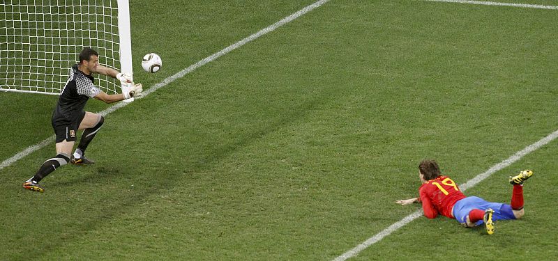 Portugal's goalkeeper Eduardo makes a save on a shot by Spain's Fernando Llorente in Cape Town