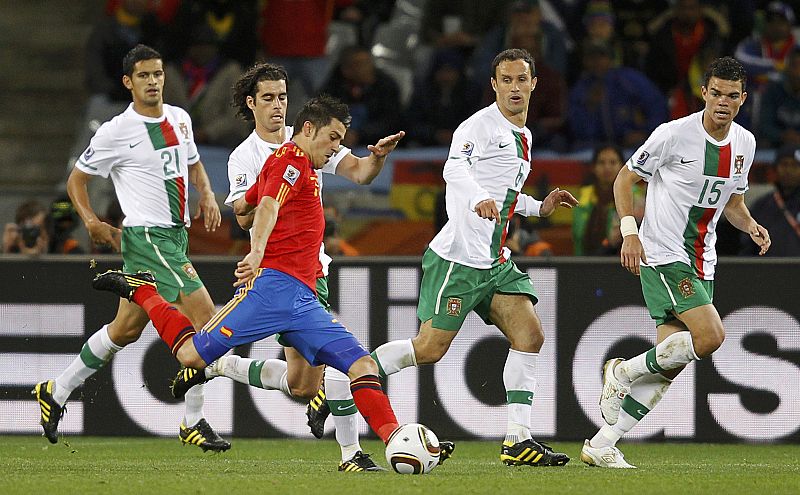 Spain's David Villa kicks the ball during the 2010 World Cup second round soccer match against Portugal at Green Point stadium in Cape Town