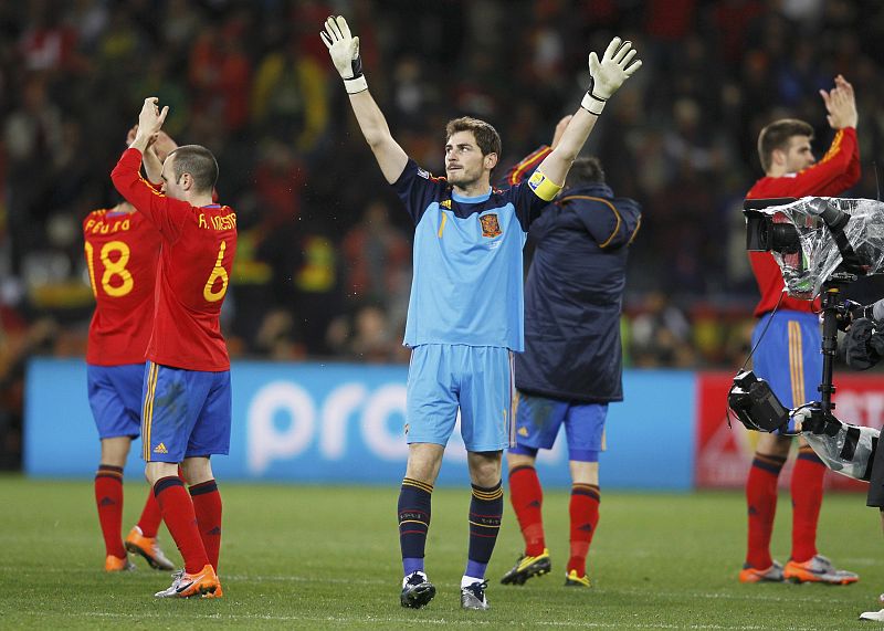 Spain's goalkeeper Casillas celebrates next to team mates after the 2010 World Cup second round soccer match between Spain and Portugal in Cape Town