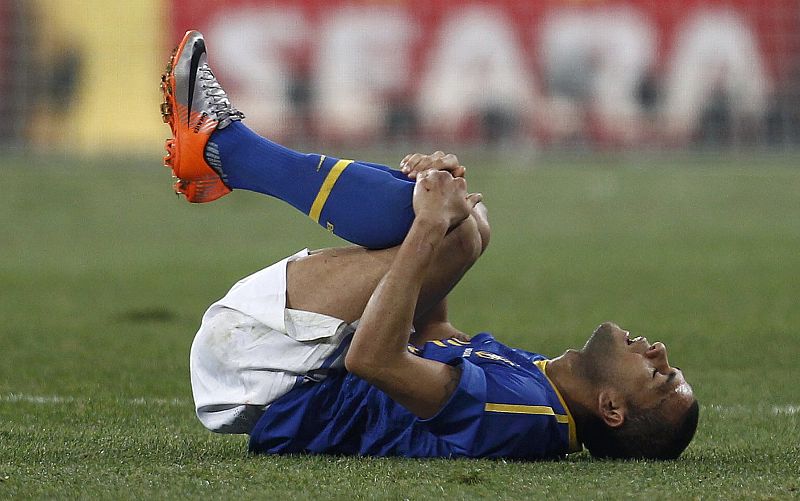 Brazil's Daniel Alves reacts after the 2010 World Cup quarter-final soccer match between Netherlands and Brazil in Port Elizabeth