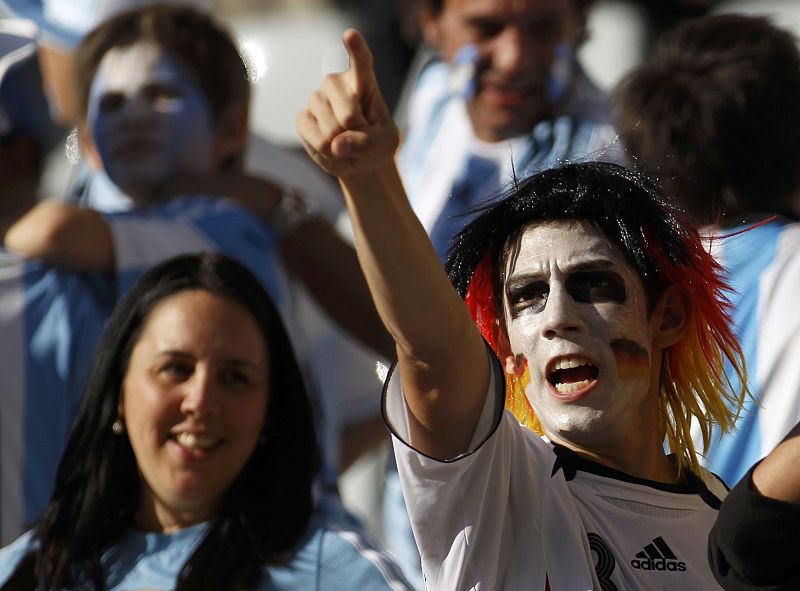 A fan gestures before the 2010 World Cup quarter-final soccer match between Argentina and Germany at Green Point stadium in Cape Town