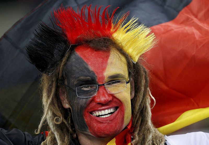 A German soccer fan smiles before the 2010 World Cup semi-final soccer match between Germany and Spain at Moses Mabhida stadium in Durban