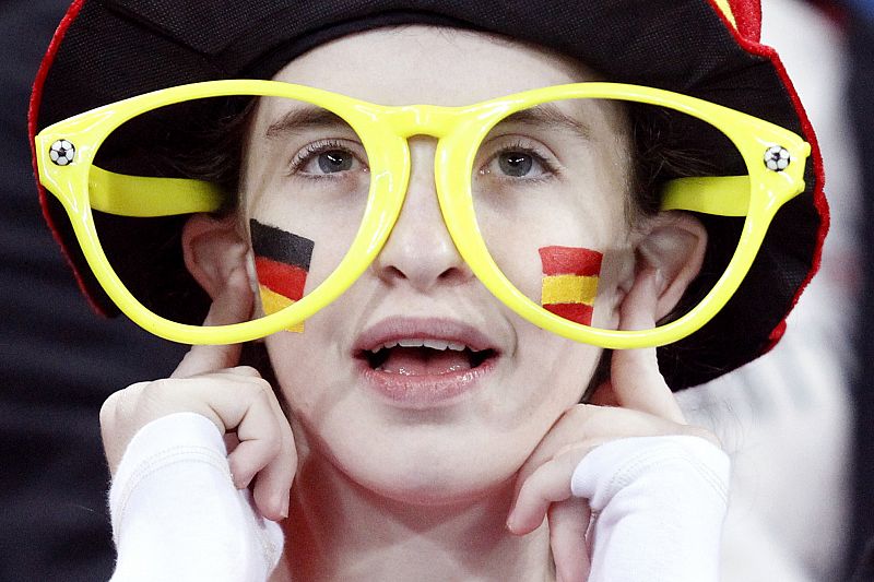 A fan waits for the start of a 2010 World Cup semi-final soccer match between Spain and Germany at Moses Mabhida stadium in Durban