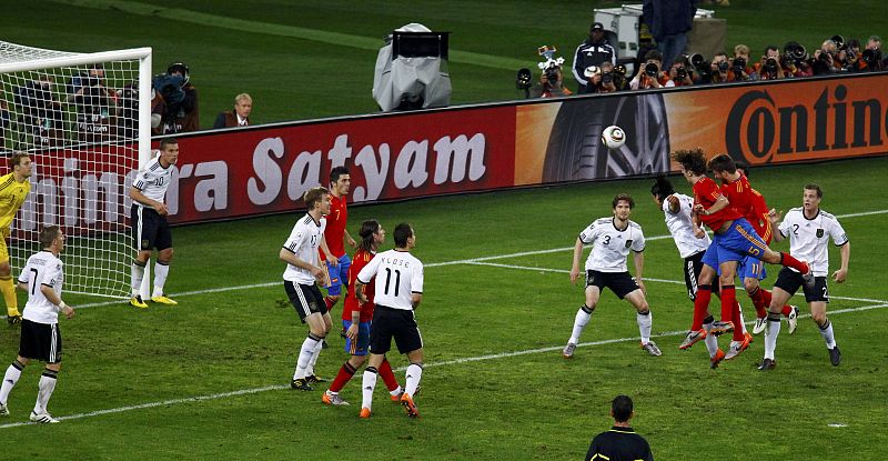 Spain's Puyol heads to score against Germany's during their World Cup semi-final soccer match at Moses Mabhida stadium in Durban