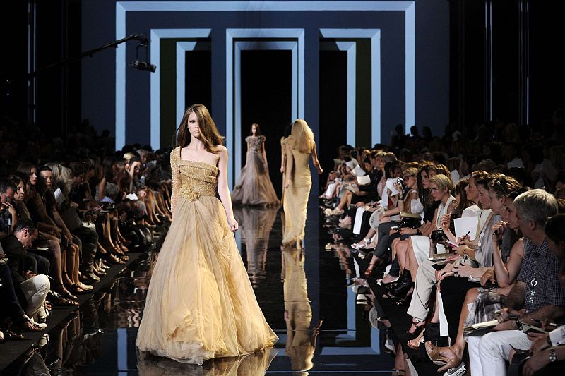 Models present creations by Lebanese designer Elie Saab as part of his Fall/Winter 2010-2011 Haute Couture fashion show in Paris