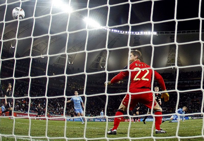 Uruguay's Forlan shoots to score against Germany during their 2010 World Cup third place playoff soccer match in Port Elizabeth