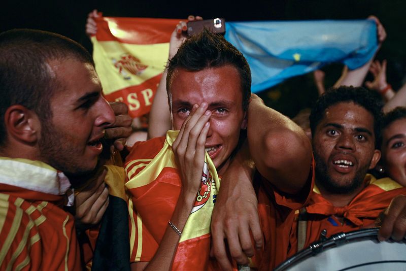 Spain's soccer fans react after their team won the 2010 World Cup final soccer match against the Netherlands