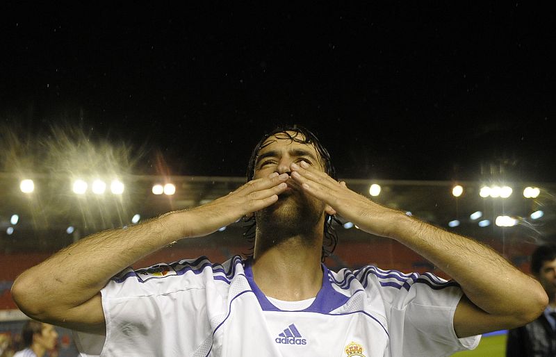 Real Madrid's Raul celebrate winning Spanish First Division soccer league title after defeating Osasuna in Pamplona