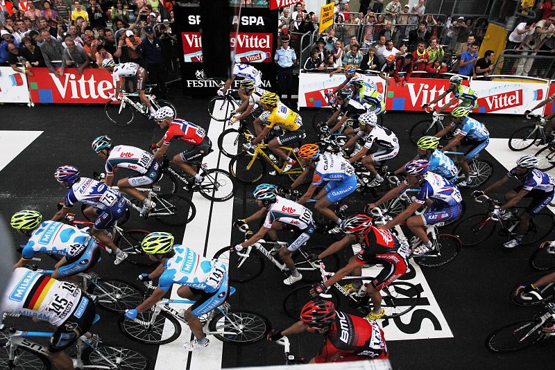 The pack of riders crosses the finish line of the second stage of the Tour de France cycling race from Brussels to Spa