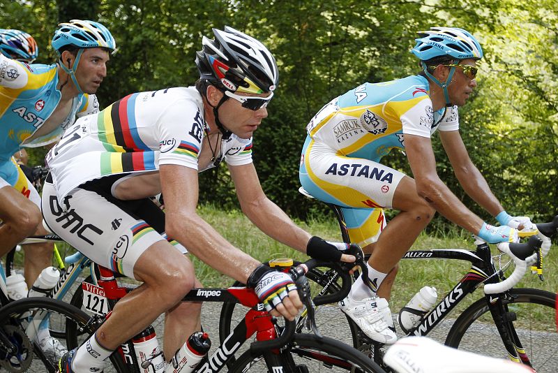 BMC Racing team rider Cadel Evans of Australia cycles with Astana team rider Alberto Contador of Spain during the seventh stage of the Tour de France cycling race between Tournus and Station des Rousses
