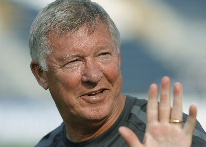 Manchester United manager Ferguson waves to the crowd during a practice session at PPL park in Chester, Pennsylvania