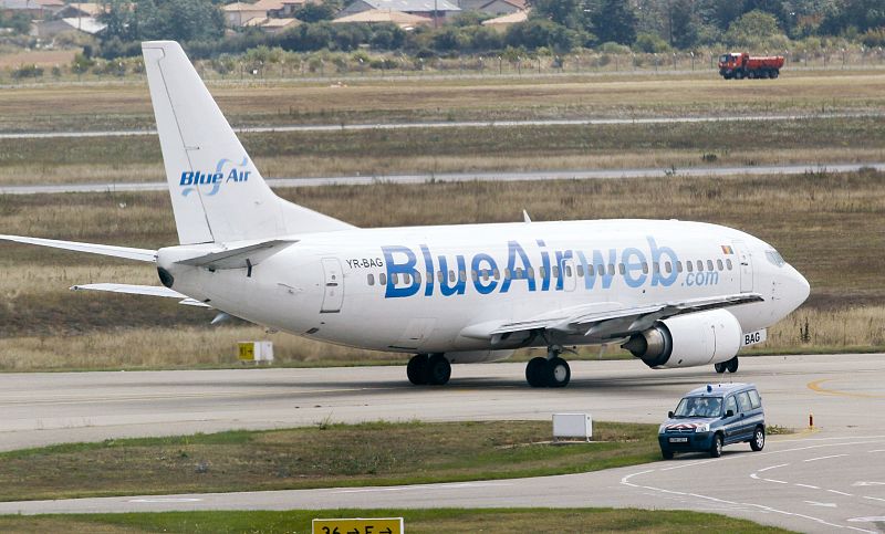 A Blue Air charter flight carrying Roma who have been expelled from France is seen on the runway at the Saint-Exupery airport of Lyon, in Satolas