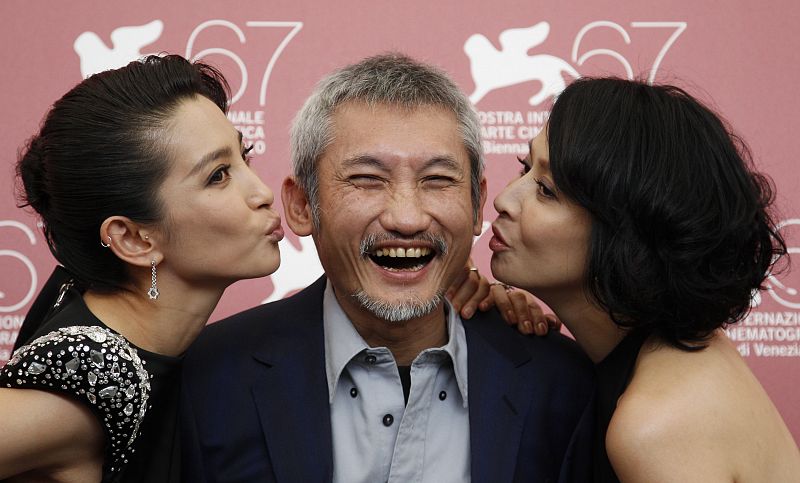 Director Tsui poses with actress Li and Lau during a photocall at the 67th Venice Film Festival