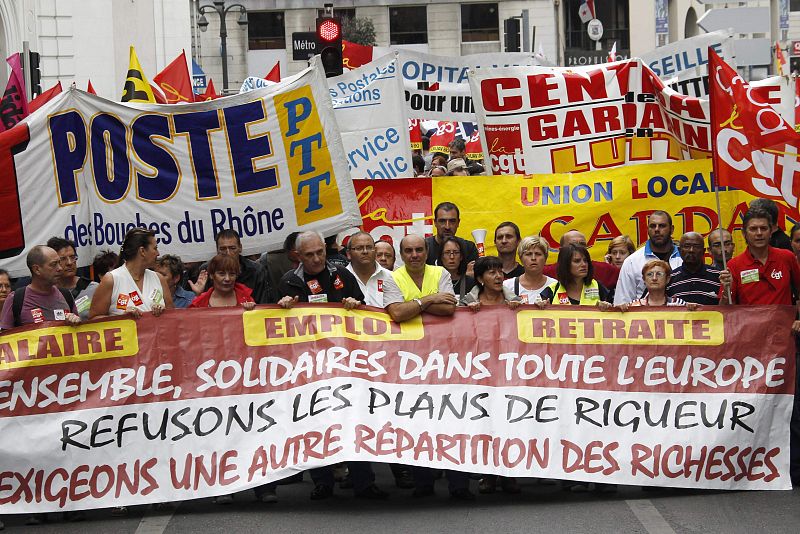 Private and public sector workers demonstrate over pension reforms in Marseille