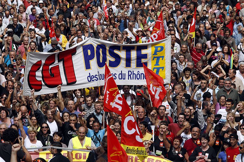 Private and public sector workers demonstrate over pension reforms in Marseille