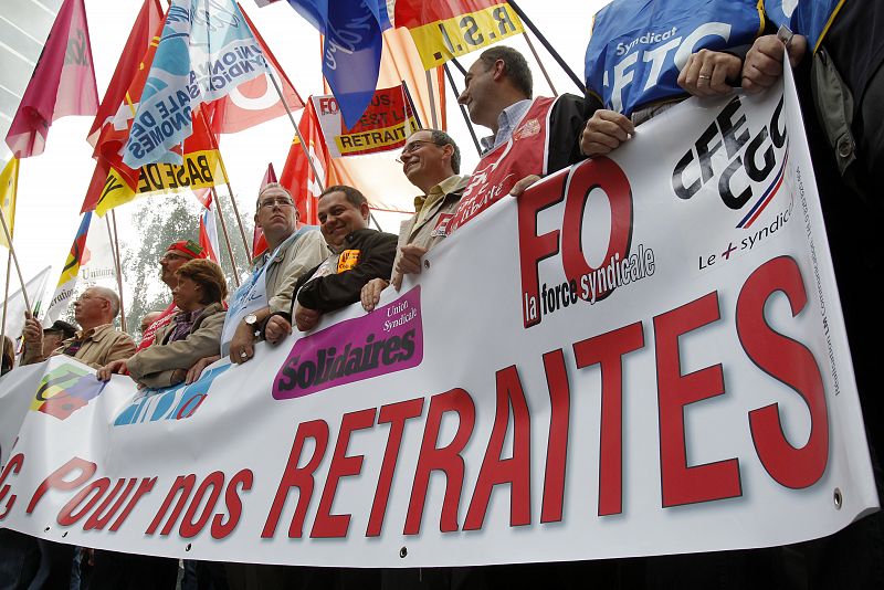 Private and public sector workers demonstrate over pension reforms in Lille