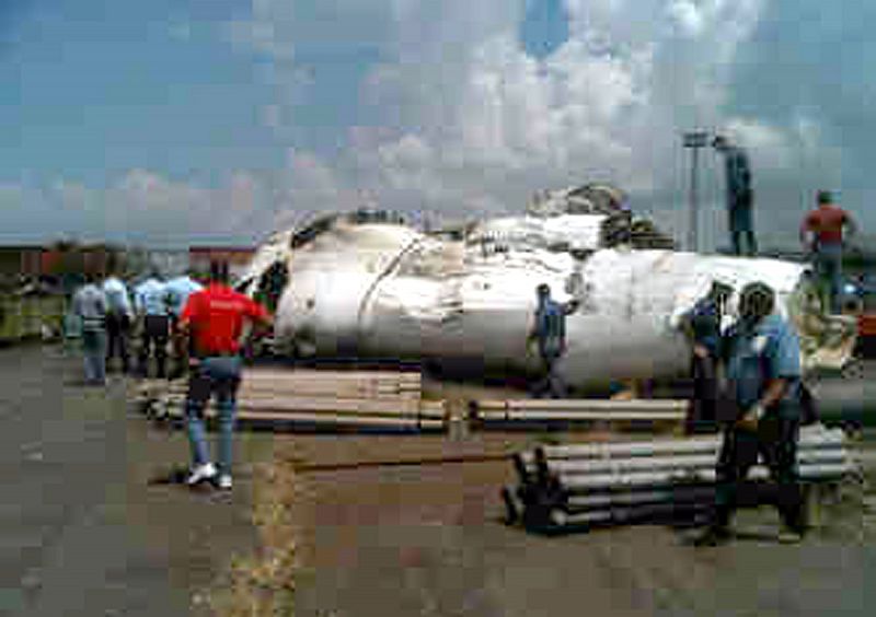 A picture shows rescue workers at the place where an ATR-42 plane crashed in Puerto Ordaz