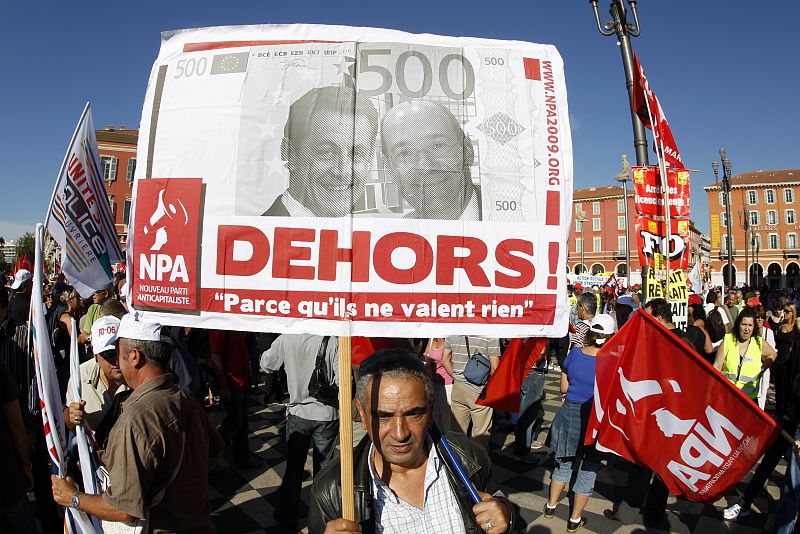 Private and public sector workers attend a demonstration over pension reforms in Nice