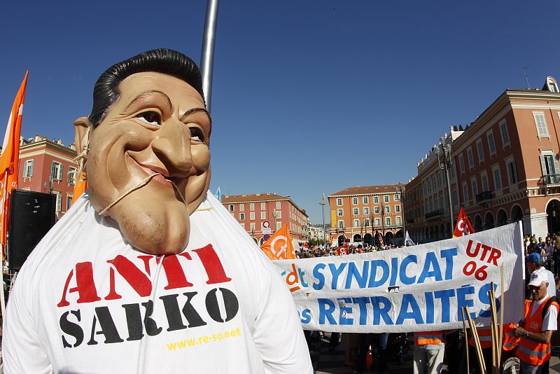 Private and public sector workers attend a demonstration over pension reforms in Nice