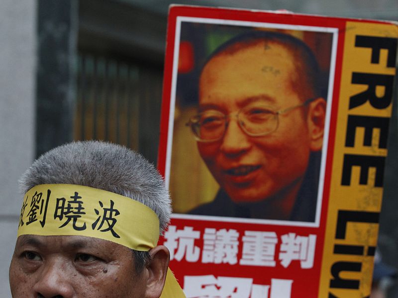 Protester demonstrate outside Chinese Foreign Ministry in Hong Kong demanding the release of Liu Xiaobo