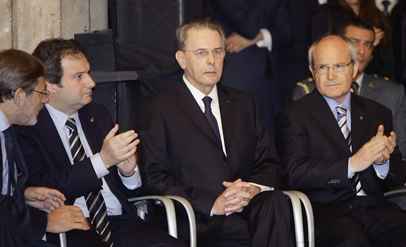 IOC President Jacques Rogge is applauded after delivering a speech during a tribute of former IOC President Samaranch in Barcelona