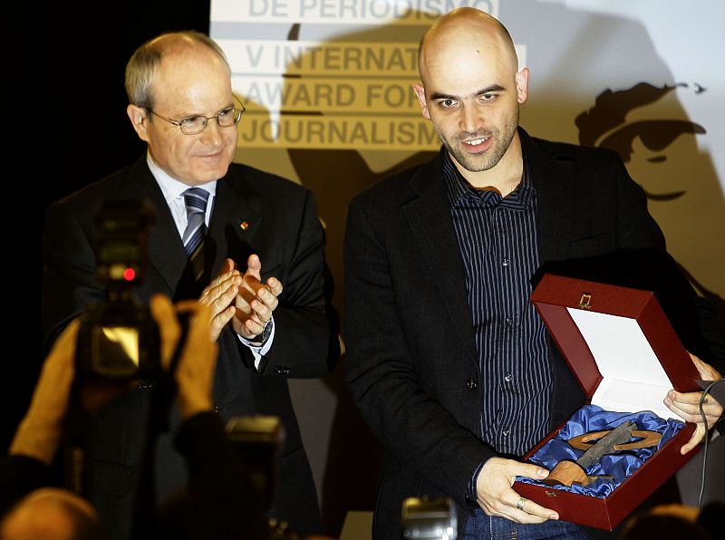 Italian writer Saviano poses for photographers after receiving the fifth edition of the Manuel Vazquez Montalban International Award in Barcelona