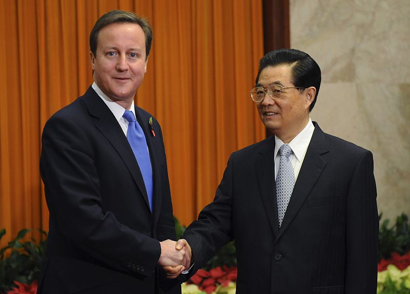 Britain's Prime Minister David Cameron meets China's President Hu Jintao at the Great Hall of the People in Beijing