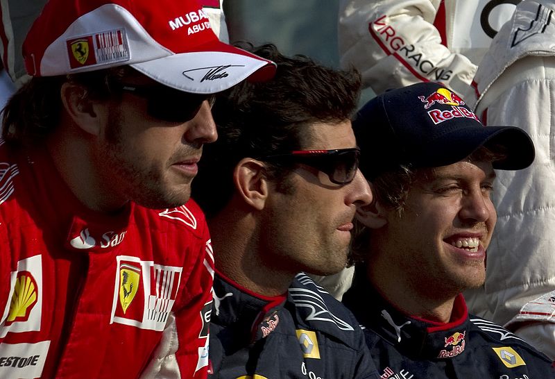 Alonso, Webber and Vettel pose at an end of season drivers' photograph before the Abu Dhabi F1 Grand Prix at Yas Marina circuit  in Abu Dhabi