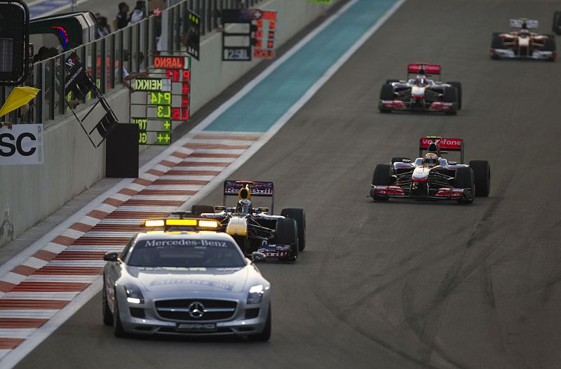 The safety car leads race car drivers after the start of the Abu Dhabi F1 Grand Prix at Yas Marina circuit in Abu Dhabi