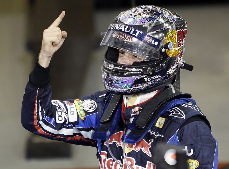 Red Bull Formula One driver Sebastian Vettel of Germany celebrates after winning the Abu Dhabi F1 Grand Prix