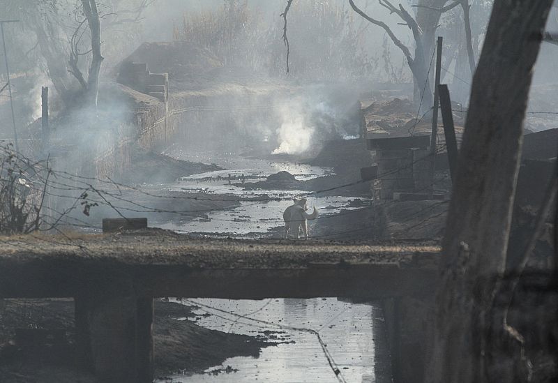 A general view shows the site of an explosion of a Pemex pipeline in the village of San Martin Texmelucan