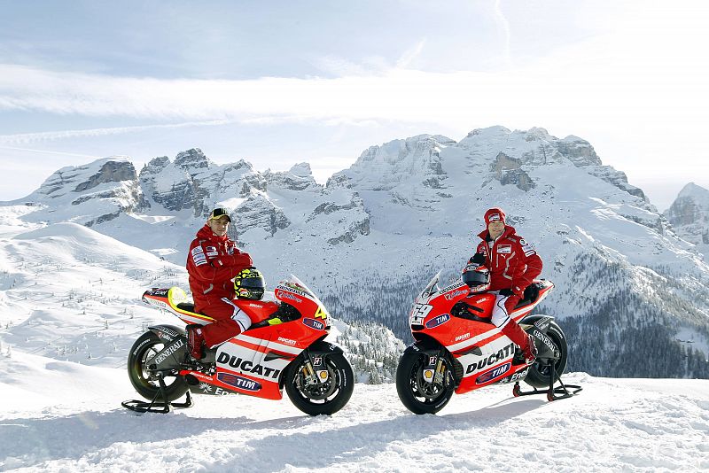 Ducati Moto GP rider Rossi poses with his teammate Hayden during official presentation of their new Ducati GP2011 motorcycles in Madonna di Campiglio