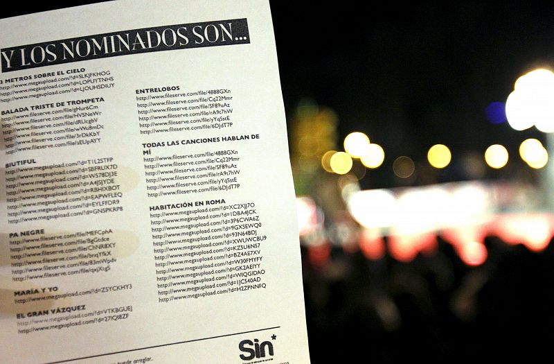 Imagen de una lista que recoge los nombres de las películas nominadas en la XXV edición de los Premios Goya y sus correspondientes enlaces para descargar los títulos