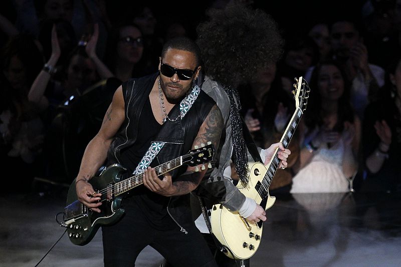 Singer Lenny Kravitz performs during player introductions before the NBA All-Star basketball game in Los Angeles.