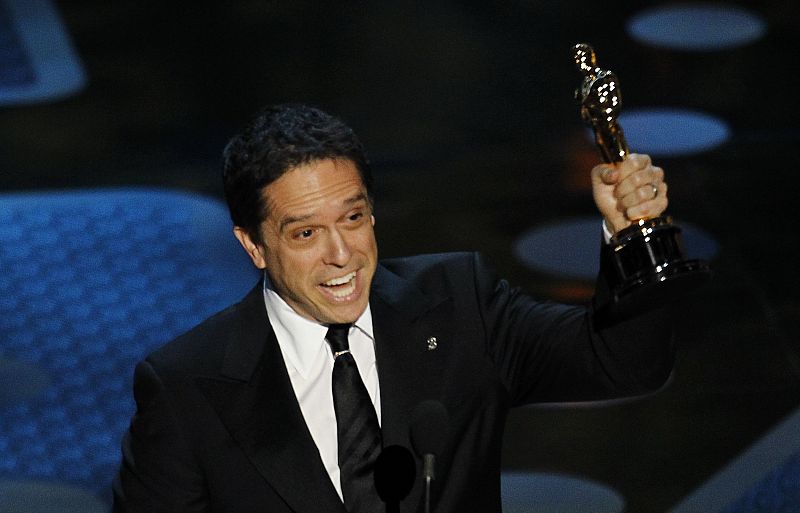 Director Lee Unkrich accepts the Oscar for best animated feature film for "Toy Story 3" during the 83rd Academy Awards in Hollywood